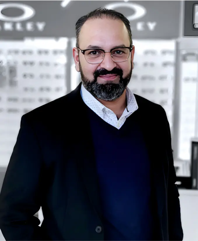 Shahzad Mian, licensed optician, providing expert eye care in Calgary.